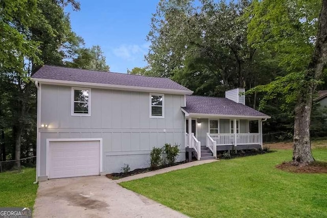 434 Mona Pl, Dallas, GA 30132 - split level home featuring covered porch, a front lawn, a garage, and a chimney