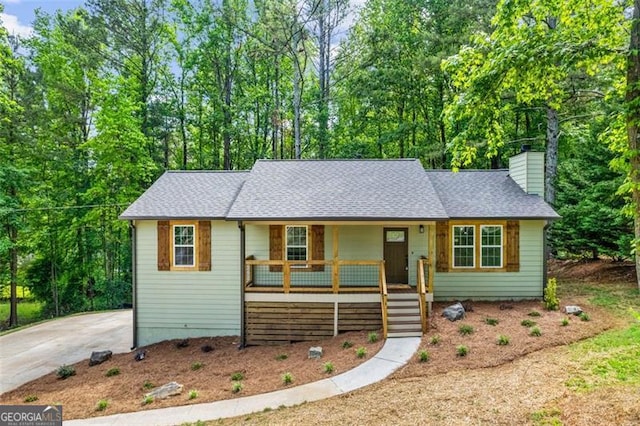 86 Williams Rd, Dallas, GA 30132 - view of front of property with covered porch, a chimney, roof with shingles, and stairway