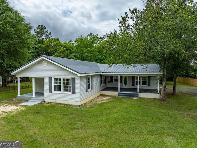 136 Oak St Unit 0, Omega, GA 31775 - back of house featuring a porch and metal roof