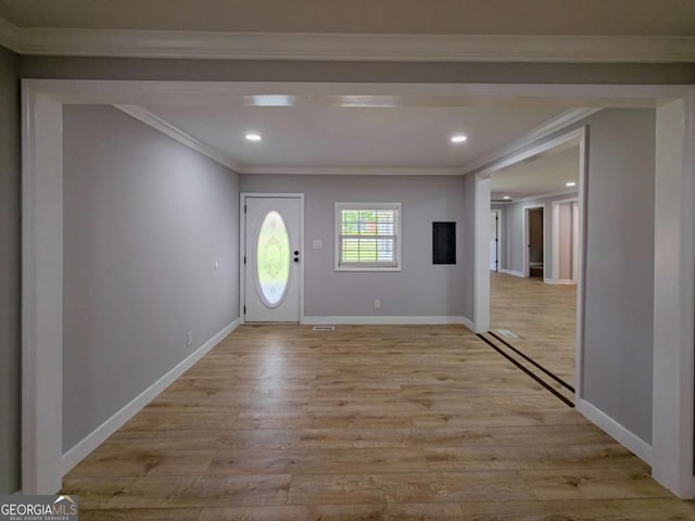 136 Oak St Unit 0, Omega, GA 31775 - entryway with light wood-style floors, crown molding, recessed lighting, and baseboards
