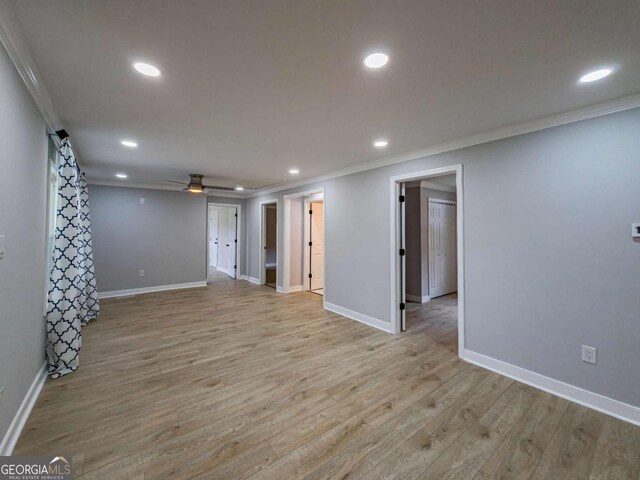 136 Oak St Unit 0, Omega, GA 31775 - below grade area with ornamental molding, recessed lighting, baseboards, light wood-style floors, and ceiling fan