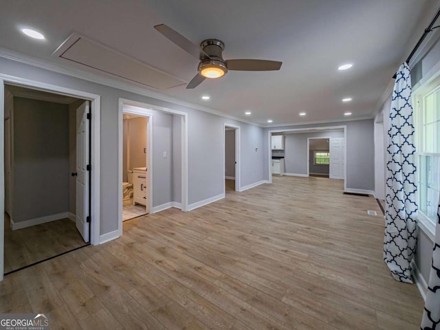 136 Oak St Unit 0, Omega, GA 31775 - unfurnished living room featuring crown molding, a ceiling fan, attic access, light wood finished floors, and baseboards