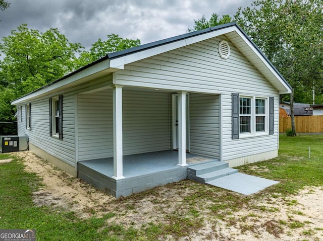 136 Oak St Unit 0, Omega, GA 31775 - view of front of home featuring central air condition unit and a porch