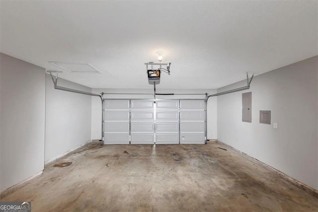 1023 Saint Augustine Pkwy, Locust Grove, GA 30248 - garage with a garage door opener and electric panel