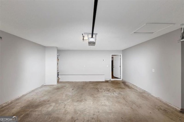 1023 Saint Augustine Pkwy, Locust Grove, GA 30248 - garage with a garage door opener