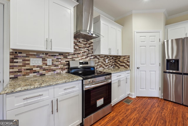 7902 W Shore Cir, Riverdale, GA 30296 - kitchen with appliances with stainless steel finishes, wall chimney exhaust hood, dark wood-style flooring, white cabinets, and crown molding