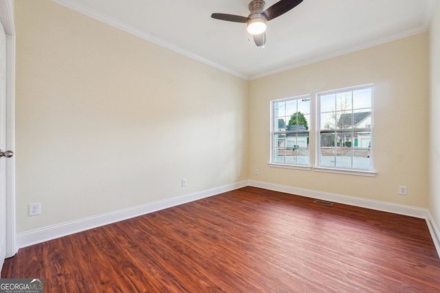 7902 W Shore Cir, Riverdale, GA 30296 - unfurnished room featuring dark wood-style flooring, a ceiling fan, baseboards, and ornamental molding