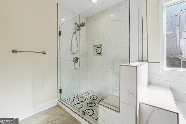 7902 W Shore Cir, Riverdale, GA 30296 - full bath with a shower stall, plenty of natural light, and baseboards