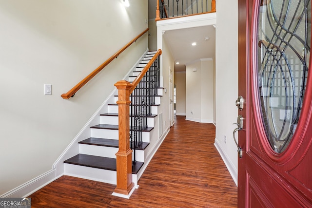 7902 W Shore Cir, Riverdale, GA 30296 - entryway featuring baseboards, wood finished floors, stairs, and a towering ceiling