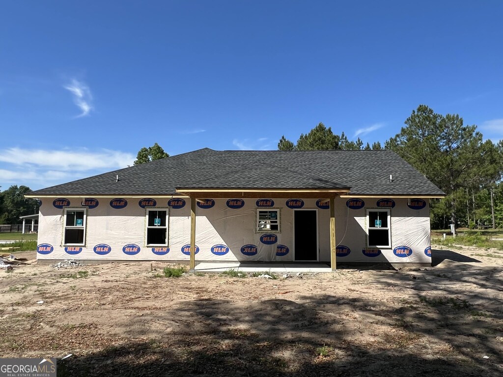 130 NE Kalynne Way, Ludowici, GA 31316 - view of front of house with a shingled roof