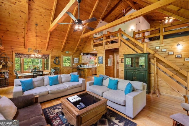 1600 My Mountain Rd, Morganton, GA 30560 - living area with wooden walls, wooden ceiling, light wood-style flooring, beam ceiling, and a ceiling fan