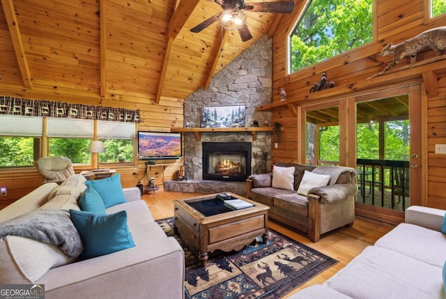 1600 My Mountain Rd, Morganton, GA 30560 - living room featuring wood ceiling, healthy amount of natural light, ceiling fan, wood finished floors, and beamed ceiling