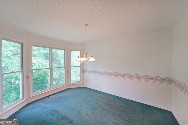 251 Lambeth Dr, Hiram, GA 30141 - empty room featuring a chandelier, a textured ceiling, ornamental molding, plenty of natural light, and dark colored carpet