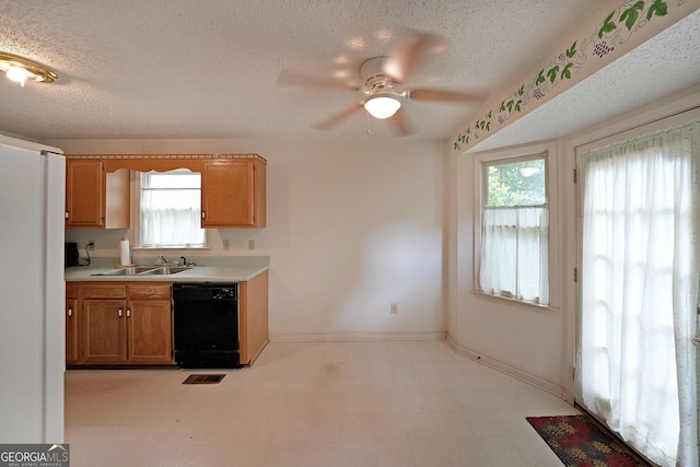251 Lambeth Dr, Hiram, GA 30141 - kitchen featuring dishwasher, ceiling fan, light countertops, light flooring, and a sink
