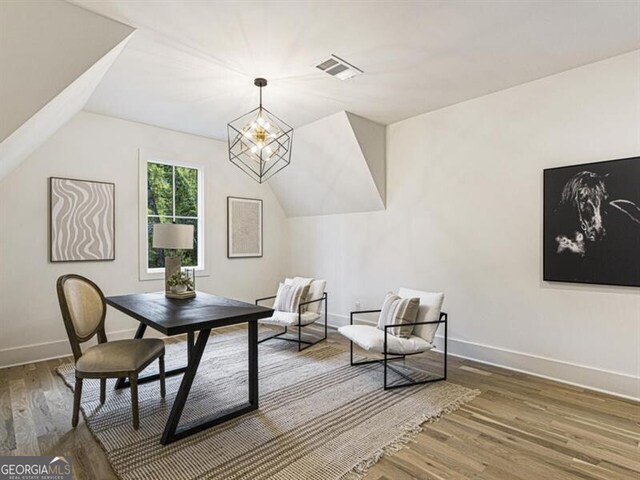 2000 Birmingham Rd, Milton, GA 30004 - dining room with wood finished floors, lofted ceiling, and a chandelier