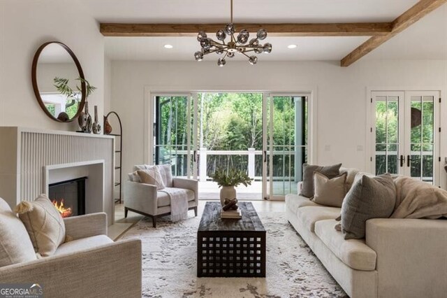 2000 Birmingham Rd, Milton, GA 30004 - living area with beam ceiling, a chandelier, a lit fireplace, and recessed lighting