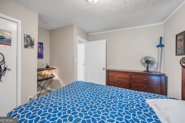 83 Summit Ridge Cir SE, Cartersville, GA 30120 - bedroom with a textured ceiling, ornamental molding, and baseboards