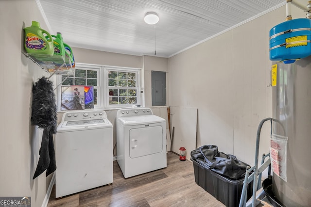 83 Summit Ridge Cir SE, Cartersville, GA 30120 - clothes washing area with independent washer and dryer, electric panel, ornamental molding, water heater, and wood finished floors
