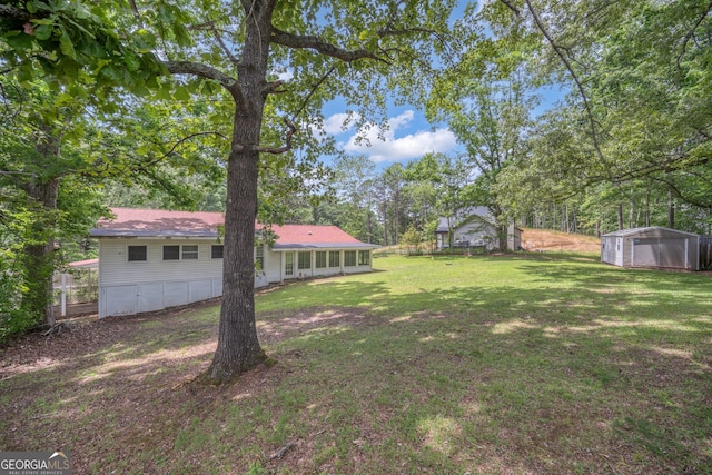 83 Summit Ridge Cir SE, Cartersville, GA 30120 - view of green lawn with an outdoor structure