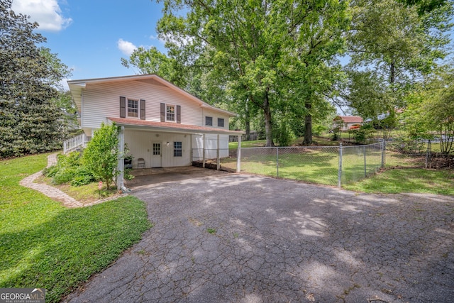 83 Summit Ridge Cir SE, Cartersville, GA 30120 - view of front of property featuring driveway and a carport