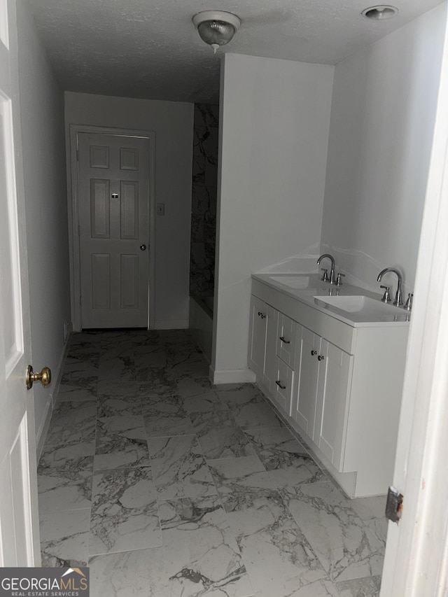 175 Thigpen Rd, Newnan, GA 30263 - bathroom with marble look tiles, baseboards, vanity, and a shower