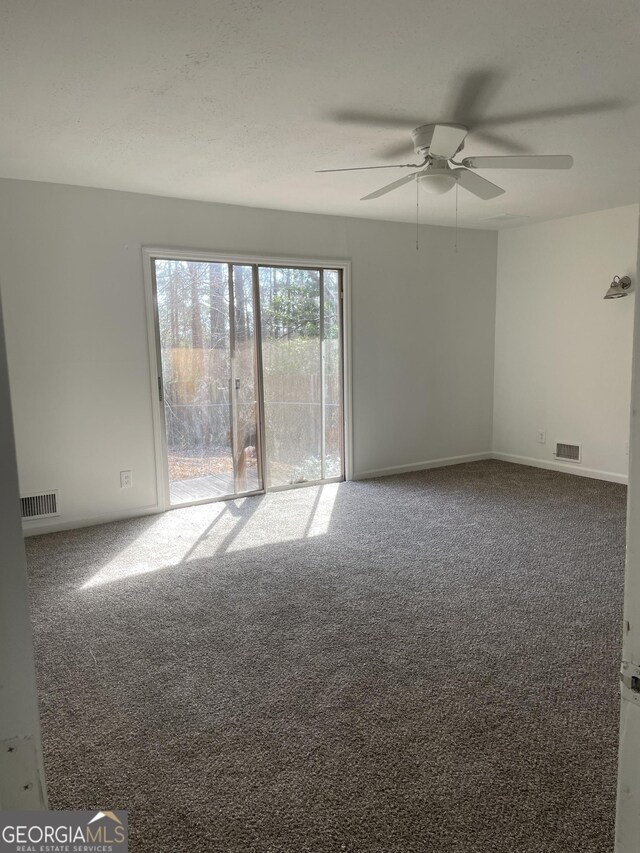 175 Thigpen Rd, Newnan, GA 30263 - spare room with carpet floors and a ceiling fan