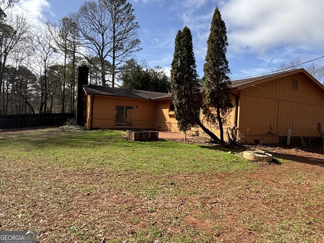 175 Thigpen Rd, Newnan, GA 30263 - rear view of property with a chimney