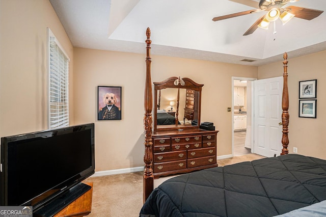 325 N Oakland Cir, Mcdonough, GA 30253 - bedroom featuring light colored carpet, baseboards, ceiling fan, and ensuite bathroom