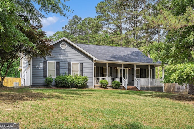 325 N Oakland Cir, Mcdonough, GA 30253 - ranch-style house featuring covered porch and a front lawn