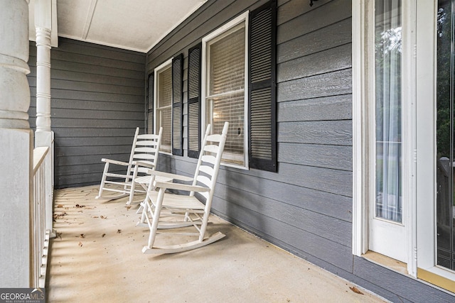 325 N Oakland Cir, Mcdonough, GA 30253 - view of patio / terrace featuring a porch