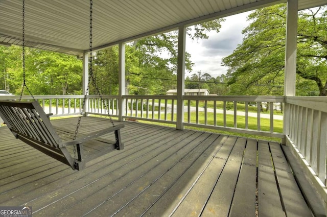 deck with view of wooded area