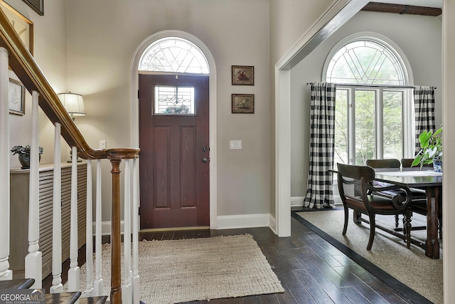 100 Rosemont, Peachtree City, GA 30269 - entryway featuring a towering ceiling, dark wood-style floors, baseboards, and stairs
