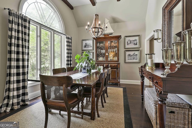 100 Rosemont, Peachtree City, GA 30269 - dining area with a chandelier, baseboards, dark wood-style flooring, and high vaulted ceiling