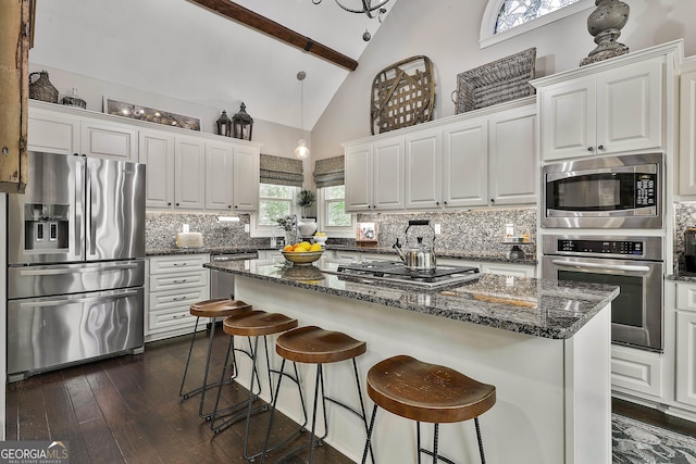 100 Rosemont, Peachtree City, GA 30269 - kitchen featuring stainless steel appliances, high vaulted ceiling, white cabinets, beamed ceiling, and tasteful backsplash