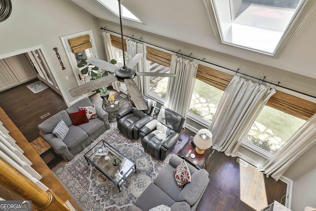 100 Rosemont, Peachtree City, GA 30269 - living room with wood finished floors, high vaulted ceiling, and baseboards