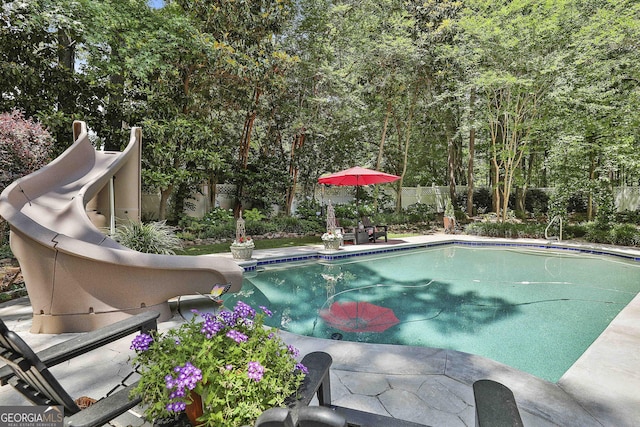 100 Rosemont, Peachtree City, GA 30269 - view of swimming pool with a fenced backyard, a water slide, and a patio