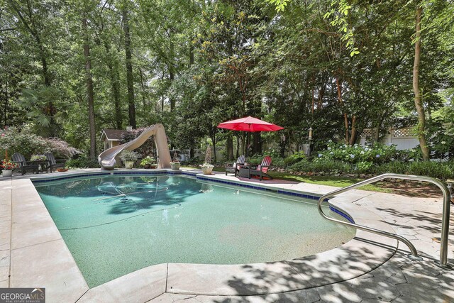 100 Rosemont, Peachtree City, GA 30269 - swimming pool featuring a water slide and a patio