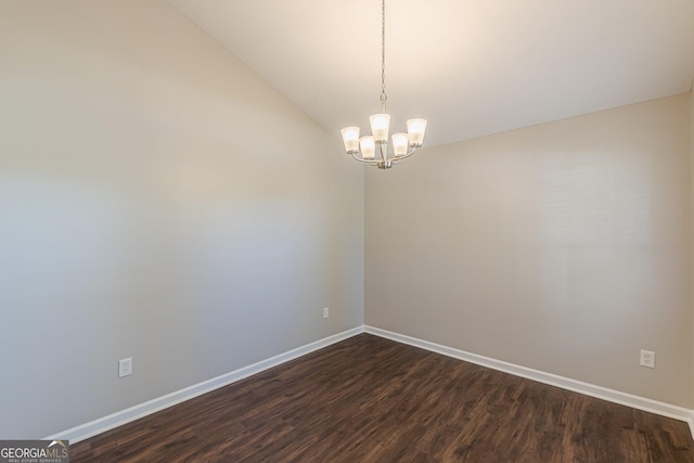 363 Chadwick Commons, Stockbridge, GA 30281 - empty room with a chandelier, baseboards, dark wood-type flooring, and vaulted ceiling