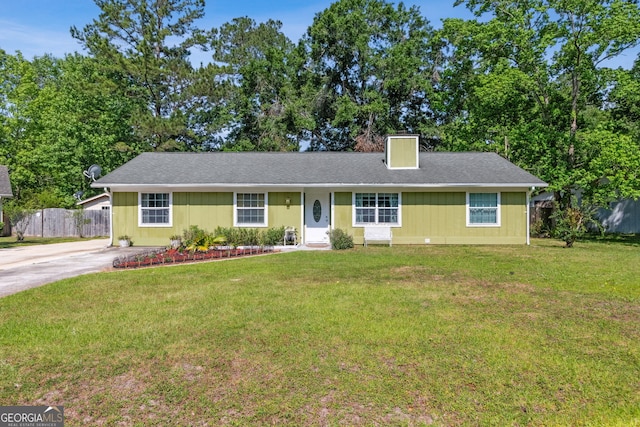 114 Pineneedle Ct, Kingsland, GA 31548 - view of front of home with a chimney and driveway