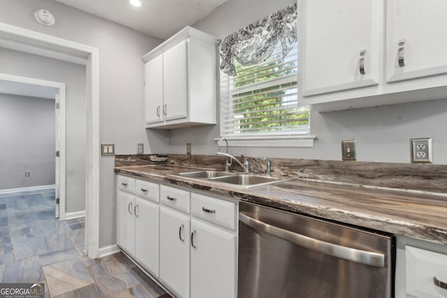 114 Pineneedle Ct, Kingsland, GA 31548 - kitchen featuring dishwasher, a sink, white cabinetry, baseboards, and dark marble finish flooring