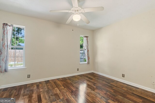 114 Pineneedle Ct, Kingsland, GA 31548 - spare room featuring dark wood-style floors, baseboards, and ceiling fan