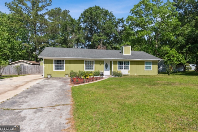 114 Pineneedle Ct, Kingsland, GA 31548 - ranch-style house featuring driveway and a chimney