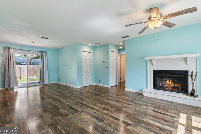 114 Pineneedle Ct, Kingsland, GA 31548 - unfurnished living room with wood finished floors, a ceiling fan, a tile fireplace, baseboards, and recessed lighting