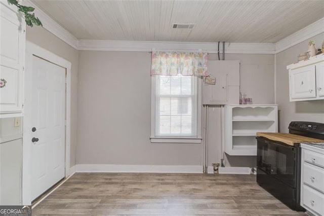 144 6th St, Monroe, GA 30655 - kitchen with black electric range oven, ornamental molding, white cabinets, electric panel, and light wood-style floors