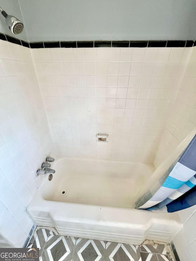 1386 Bluefield Dr SW, Atlanta, GA 30310 - bathroom with tile patterned floors and shower / bath combination