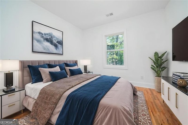 140 Racine St, Atlanta, GA 30314 - bedroom with wood finished floors and baseboards