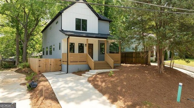 140 Racine St, Atlanta, GA 30314 - view of front of house featuring a gate and board and batten siding