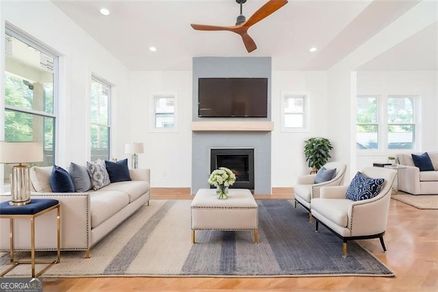 140 Racine St, Atlanta, GA 30314 - living area featuring healthy amount of natural light, ceiling fan, a large fireplace, wood finished floors, and recessed lighting