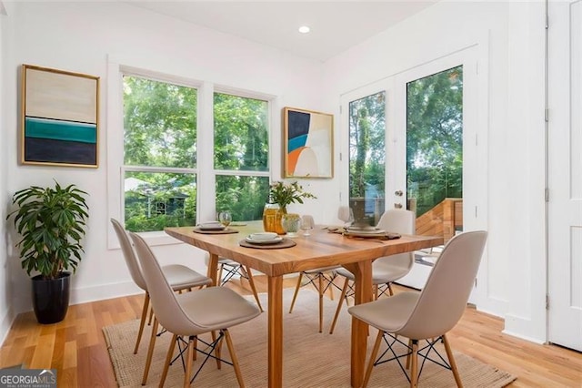 140 Racine St, Atlanta, GA 30314 - dining space featuring light wood-type flooring and baseboards