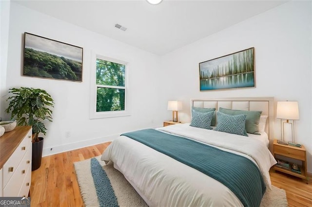 140 Racine St, Atlanta, GA 30314 - bedroom with light wood-type flooring and baseboards